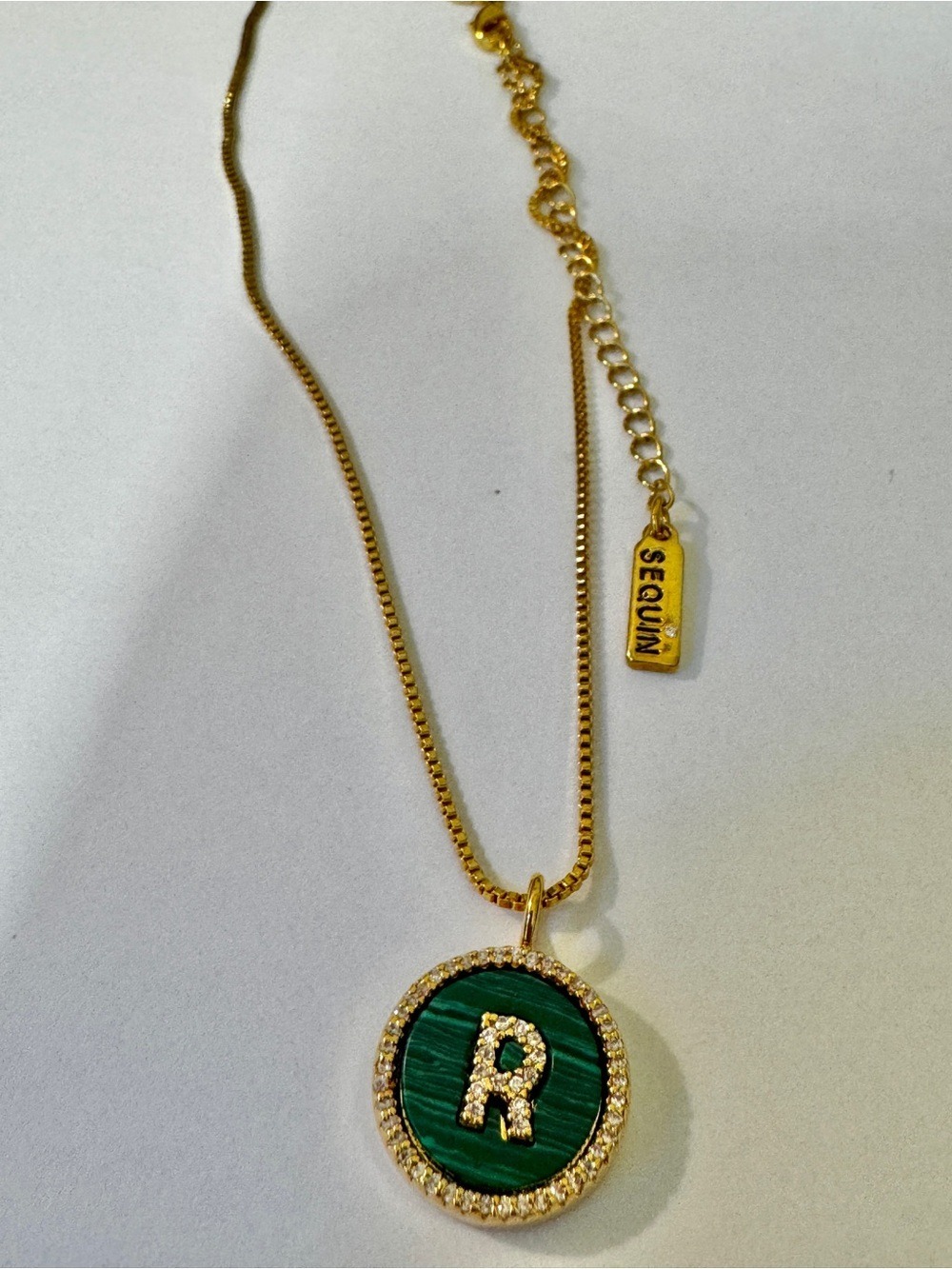 Gold-Tone Necklace with Green 'R' Initial Pendant